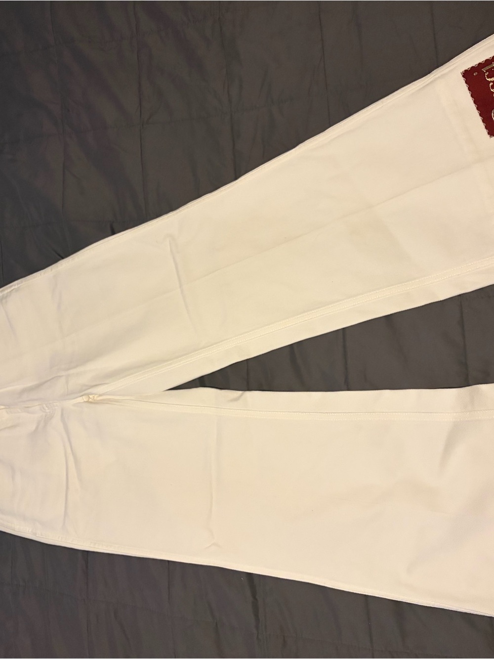 Gucci White Skinny Jeans with Subtle Red Logo Patch